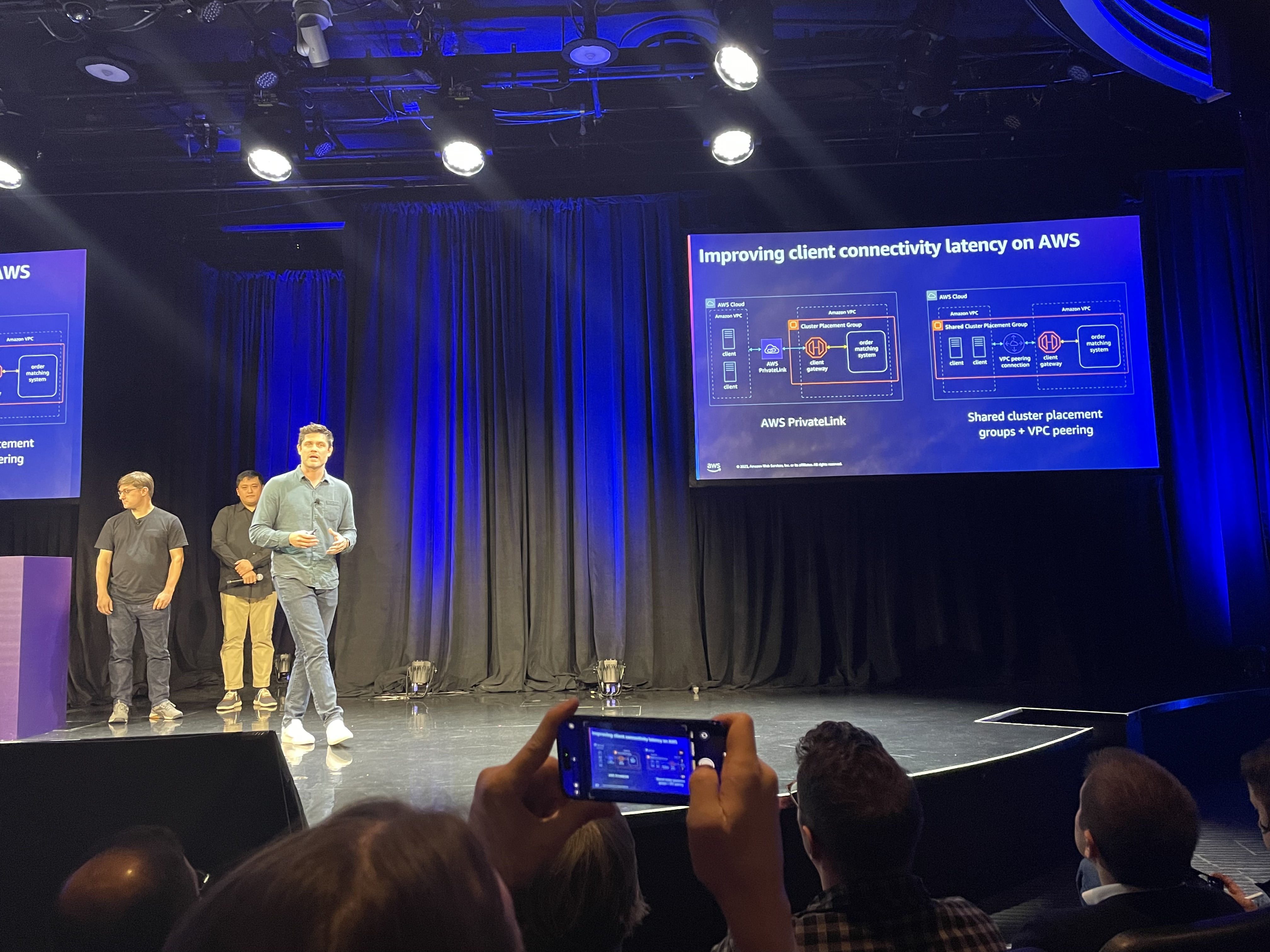 Joshua on stage at AWS re:Invent discussing client connectivity latency